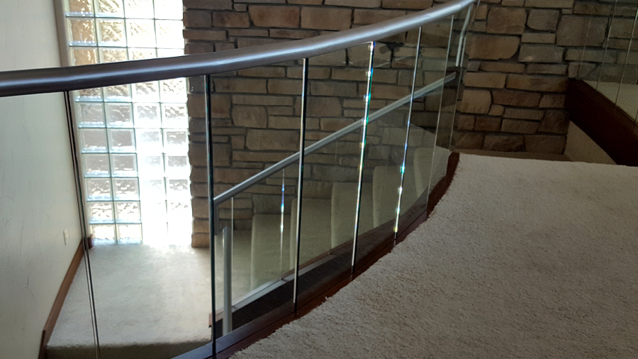 photo of cleaned glass stair railing - Peak Window Cleaning LLC specializes in professional residential window cleaning.