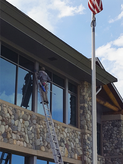 Photo: professionally cleaned windows at a Class A Commercial Building Evergreen, CO (PEAK Window Cleaning company).