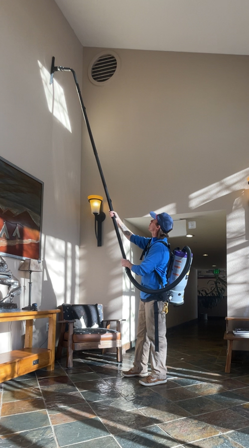 Photo: the PEAK team cleaning high walls that are out of reach.
