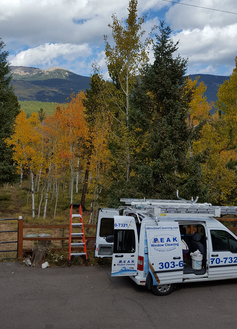 Peak Window Cleaning service vans.